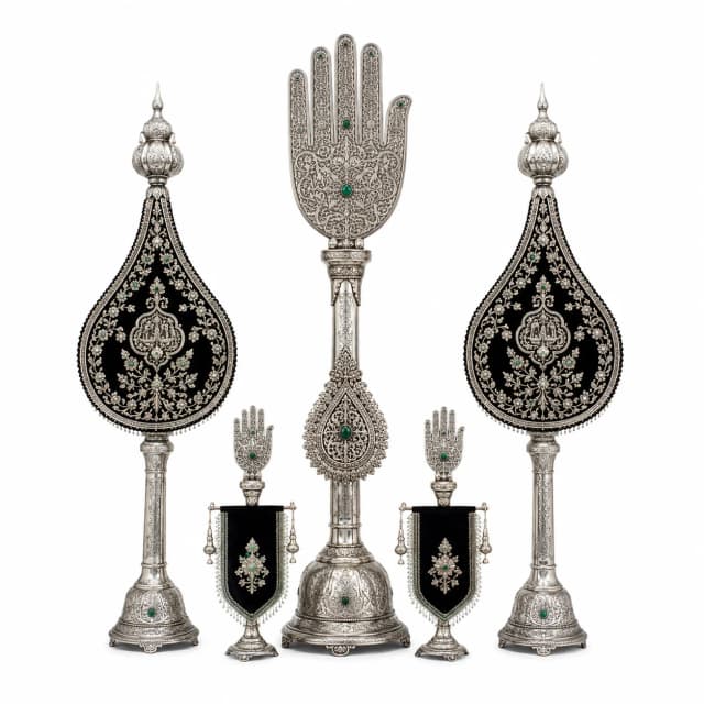 Silver alam and panja standards on turned stems