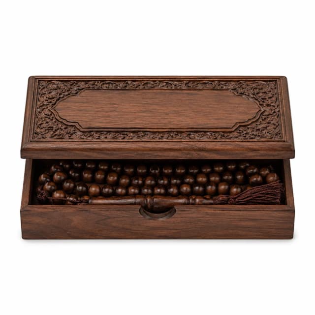 Rosewood tasbeeh in a hand-carved walnut box